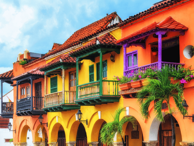 Orange, yellow, and purple houses in Cartagena, Colombia