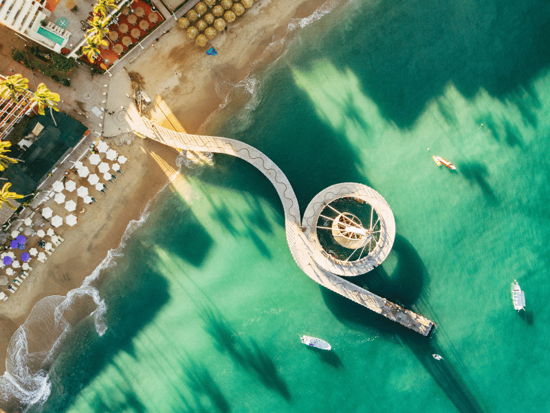 Aerial shot of a spiral dock in the tourist section of Puerto Vallarta, Mexico