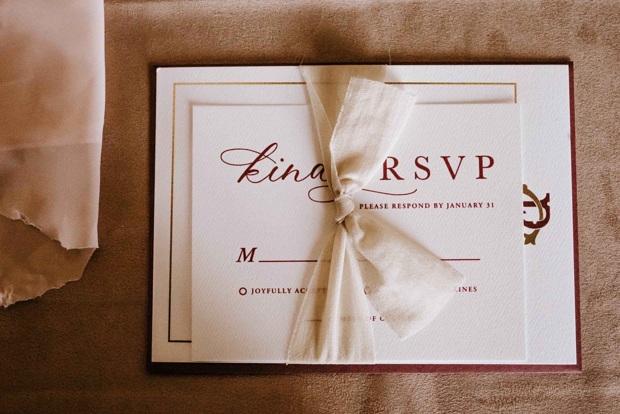 Wedding invitation suite with RSVP card.