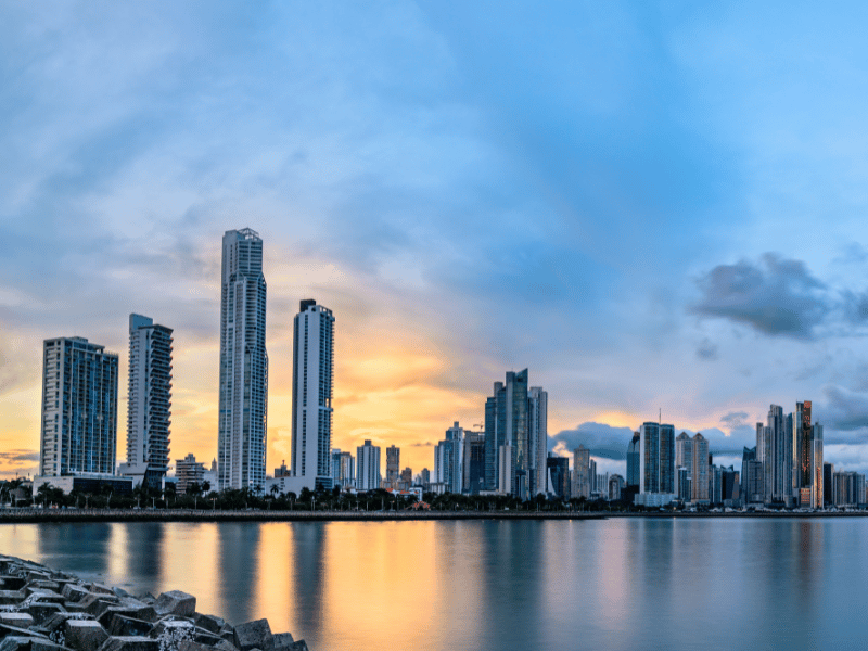 Panama City, Panama skyline at sunset over the water