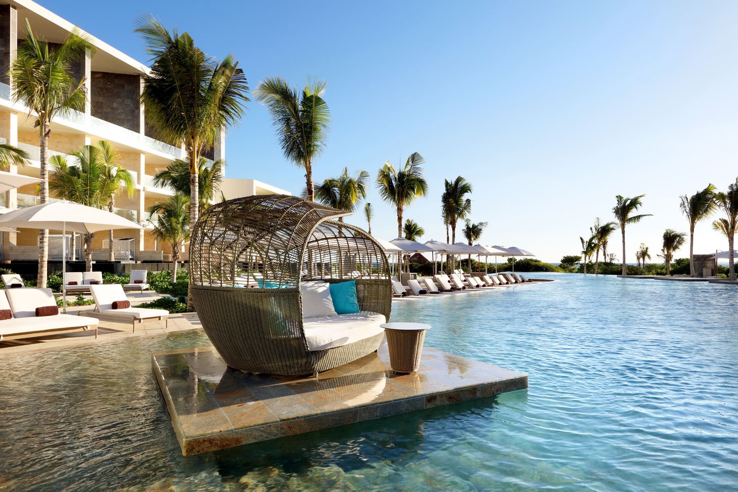 Covered chair on the pool at TRS Coral Costa Mujeres